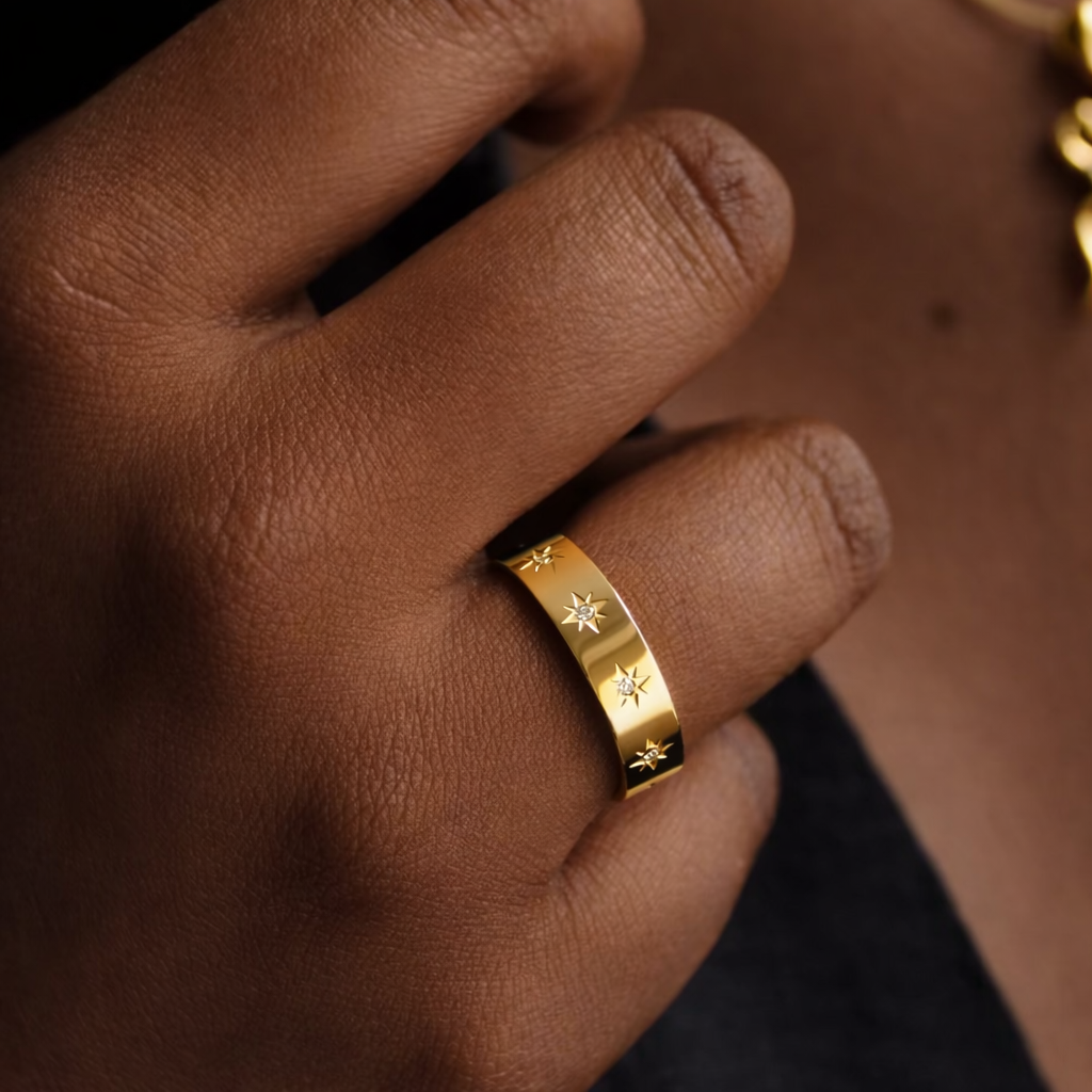 gold star ring on women's hand