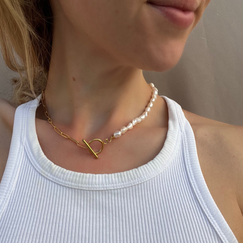 Girl in Pearl and gold chain necklace 